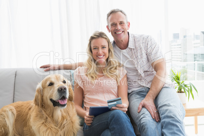 Couple with credit card shopping online