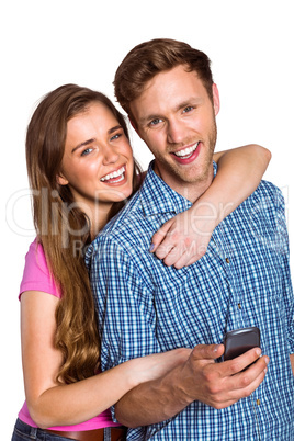 Cheerful young couple with mobile phone