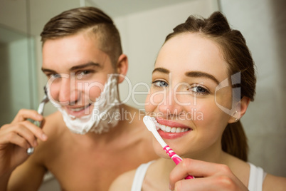 Cute couple getting ready in the morning