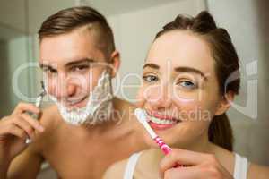 Cute couple getting ready in the morning