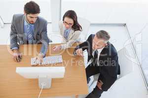 Business team watching a computer screen