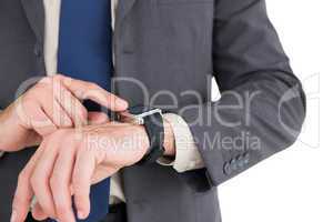 Businessman using his smart watch