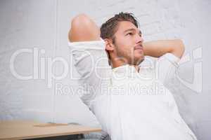 Thoughtful young businessman at office