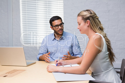 Casual colleagues in meeting at office