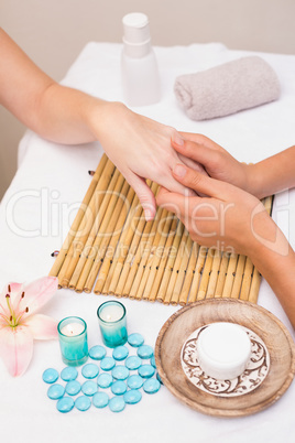 Woman getting a hand massage