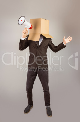 Anonymous businessman holding a megaphone