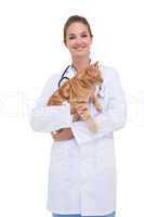 Vet holding an orange cat