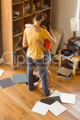 Young couple dancing to vinyl records