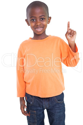 Cute boy smiling and pointing