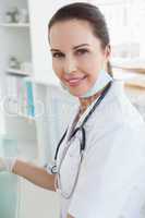 Smiling doctor in her office