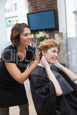 Hairdresser cutting a customers hair