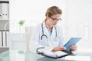 Doctor looking at the tablet pc