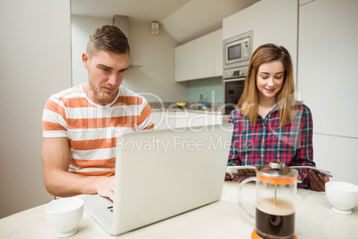 Cute couple sitting at the table