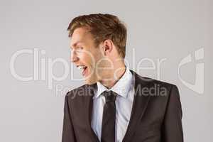 Young handsome businessman looking away