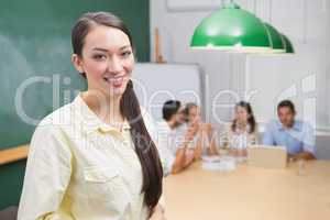 Smiling business woman leading the meeting