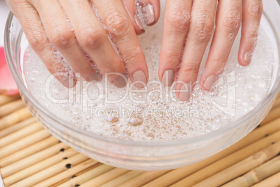 Customer washing their nails Customer washing their nails