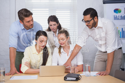 Business people working together at meeting on computer