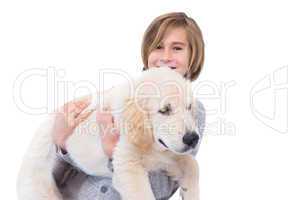 Portrait of cute boy carrying his dog