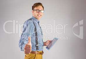 Geeky businessman using his tablet pc