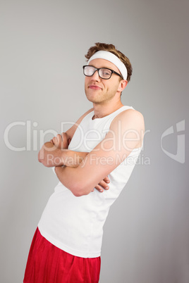 Geeky hipster posing in sportswear