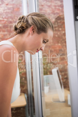 Thoughtful businesswoman in office