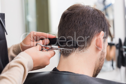 Man getting his hair trimmed