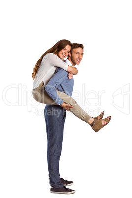 Portrait of smiling man carrying woman