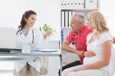 Smiling patient consulting a doctor