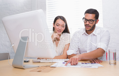 Casual colleagues in meeting at office