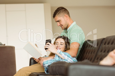 Cute couple relaxing on couch