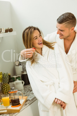 Cute couple in their bathrobes