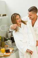 Cute couple in their bathrobes