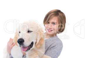 Portrait of cute boy carrying his dog