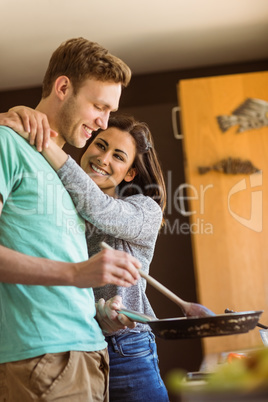 Cute couple preparing food together