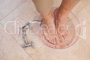 Customer soaking feet at salon