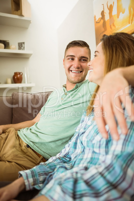 Cute couple relaxing on couch