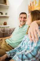 Cute couple relaxing on couch