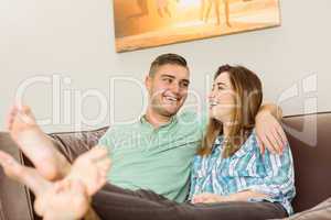 Cute couple relaxing on couch