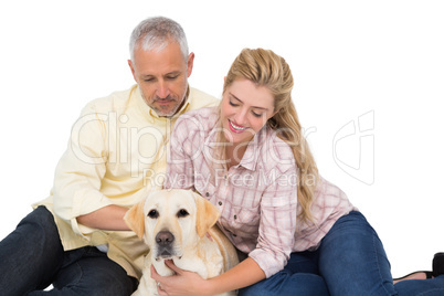 Happy couple with their pet dog