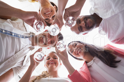 Casual business team toasting with champagne