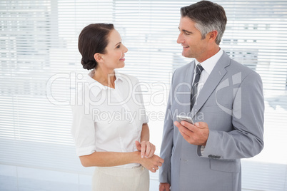 Businessman talking with co worker