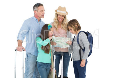 Tourist family consulting the map