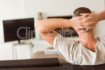 Man relaxing on his couch