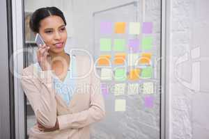 Brown haired woman calling with her mobile phone