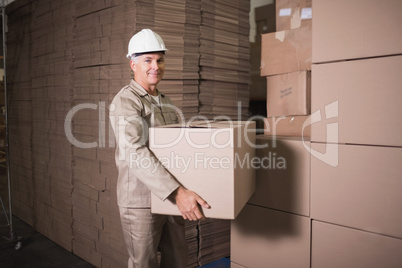 Warehouse worker loading up pallet