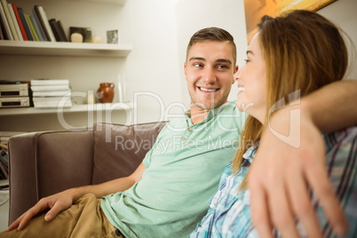 Cute couple relaxing on couch