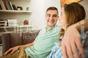 Cute couple relaxing on couch