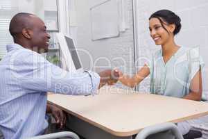 Handshake to seal a deal after a business meeting