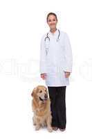 Vet standing with a dog