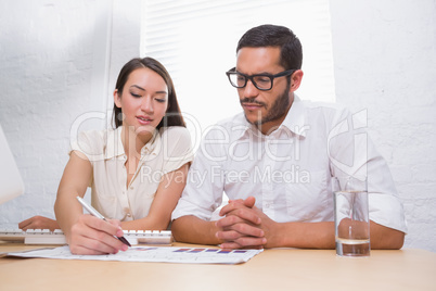 Casual colleagues in meeting at office